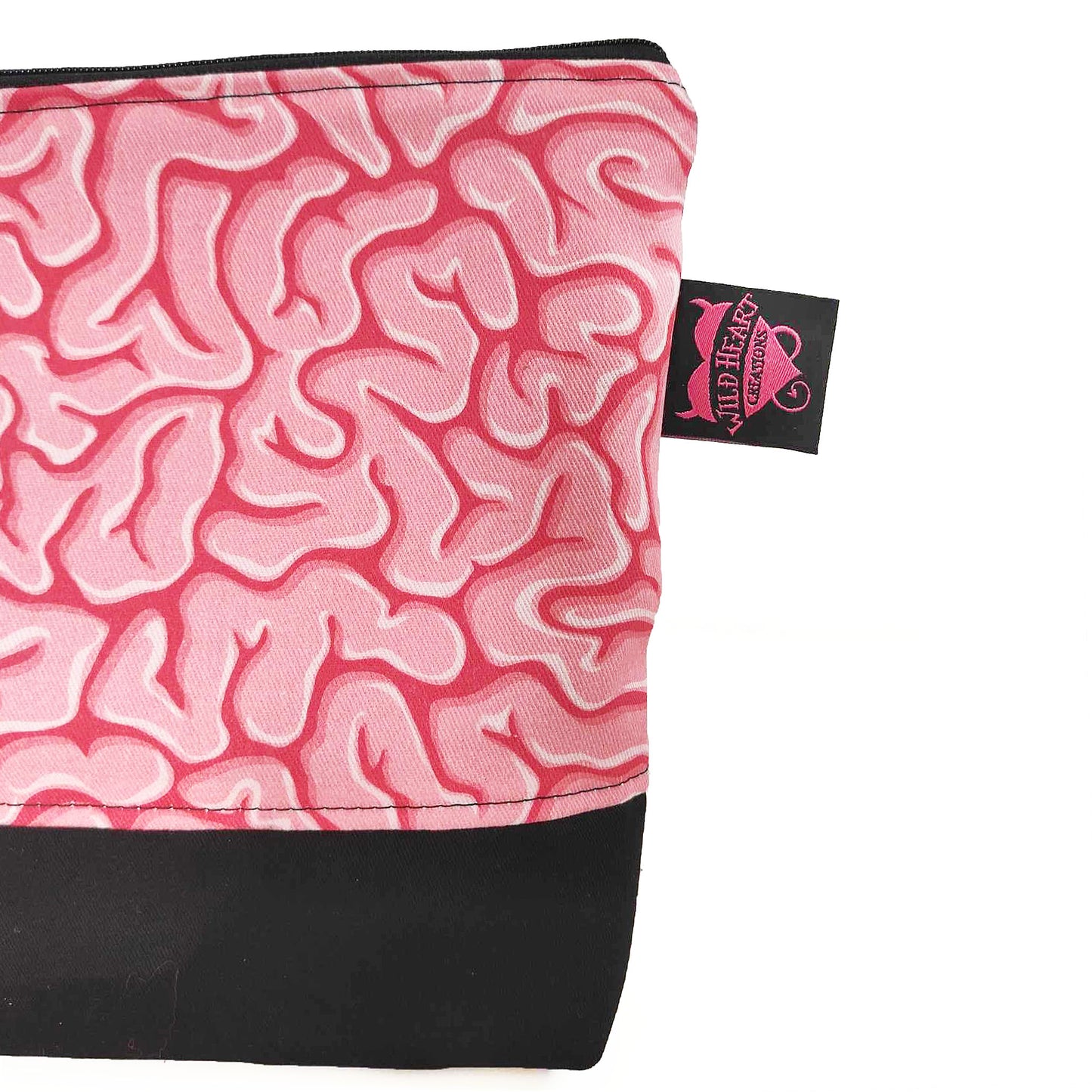 Handgefertigtes Täschchen in Rosatönen mit Gehirnmotiv. Perfekt für deinen Kleinkram und praktisch, da es in jede Tasche passt.